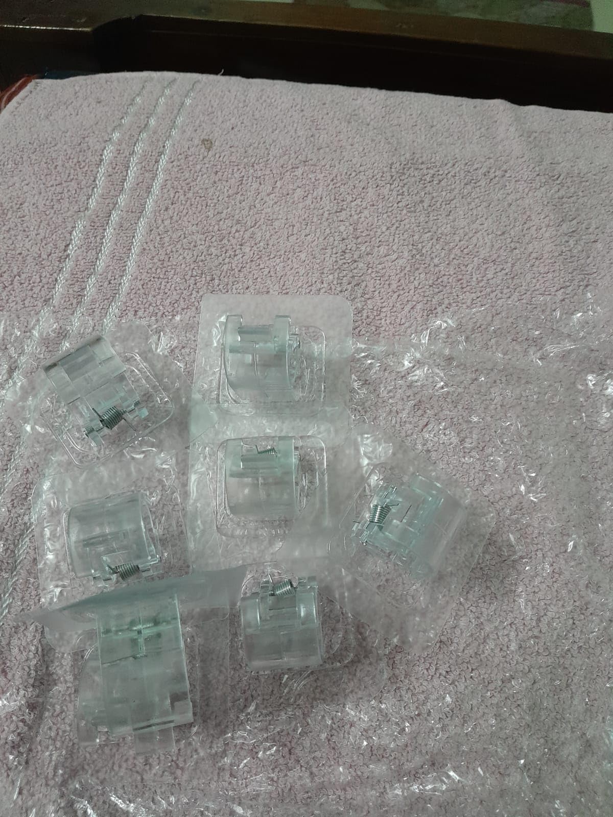 Clear plastic components on a textured surface